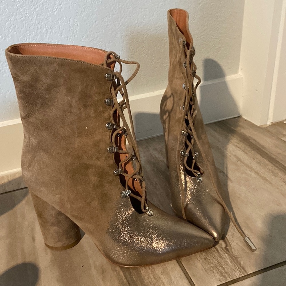 Lace up boots .
